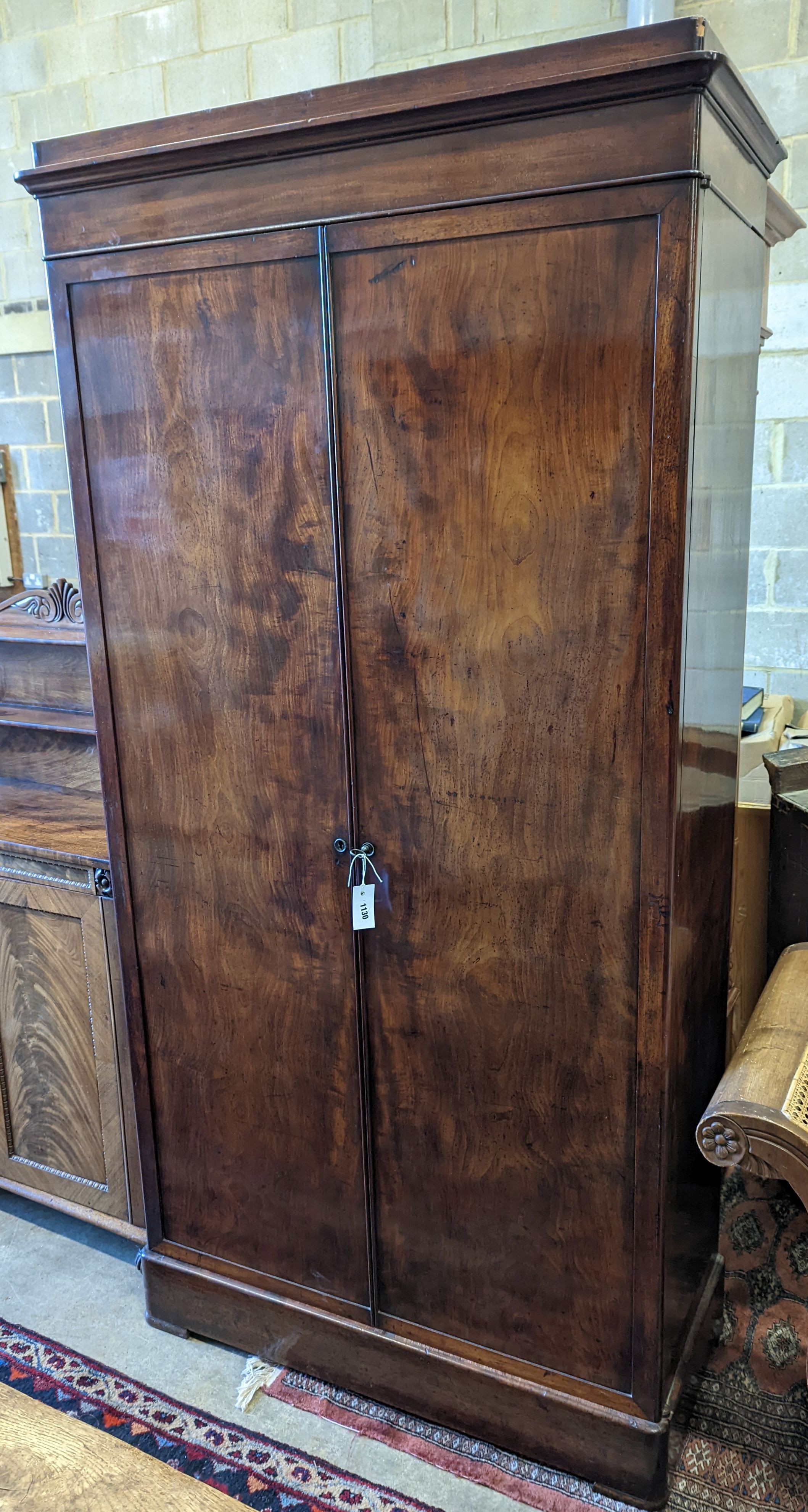 A 19th century French mahogany armoire, width 108cm, depth 47cm, height 213cm